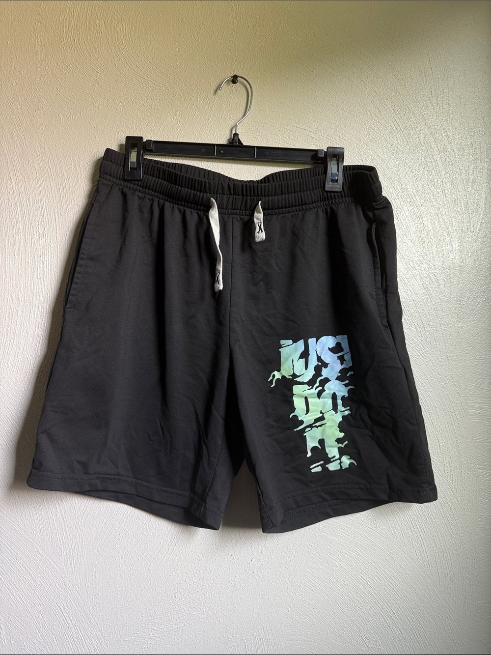 Nike Black Men's Athletic Shorts with Blue-Green Graphic